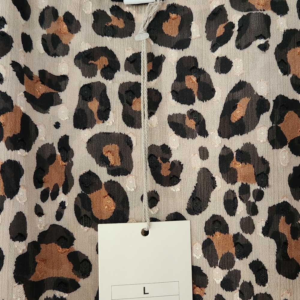 Short Sleeve Leopard blouse...Day TO Night wear